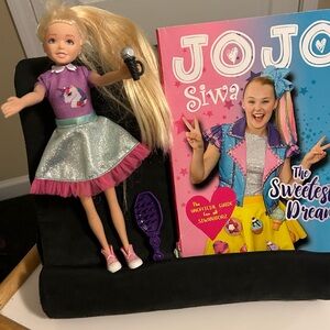 Singing JoJo Siwa Doll and her book.
